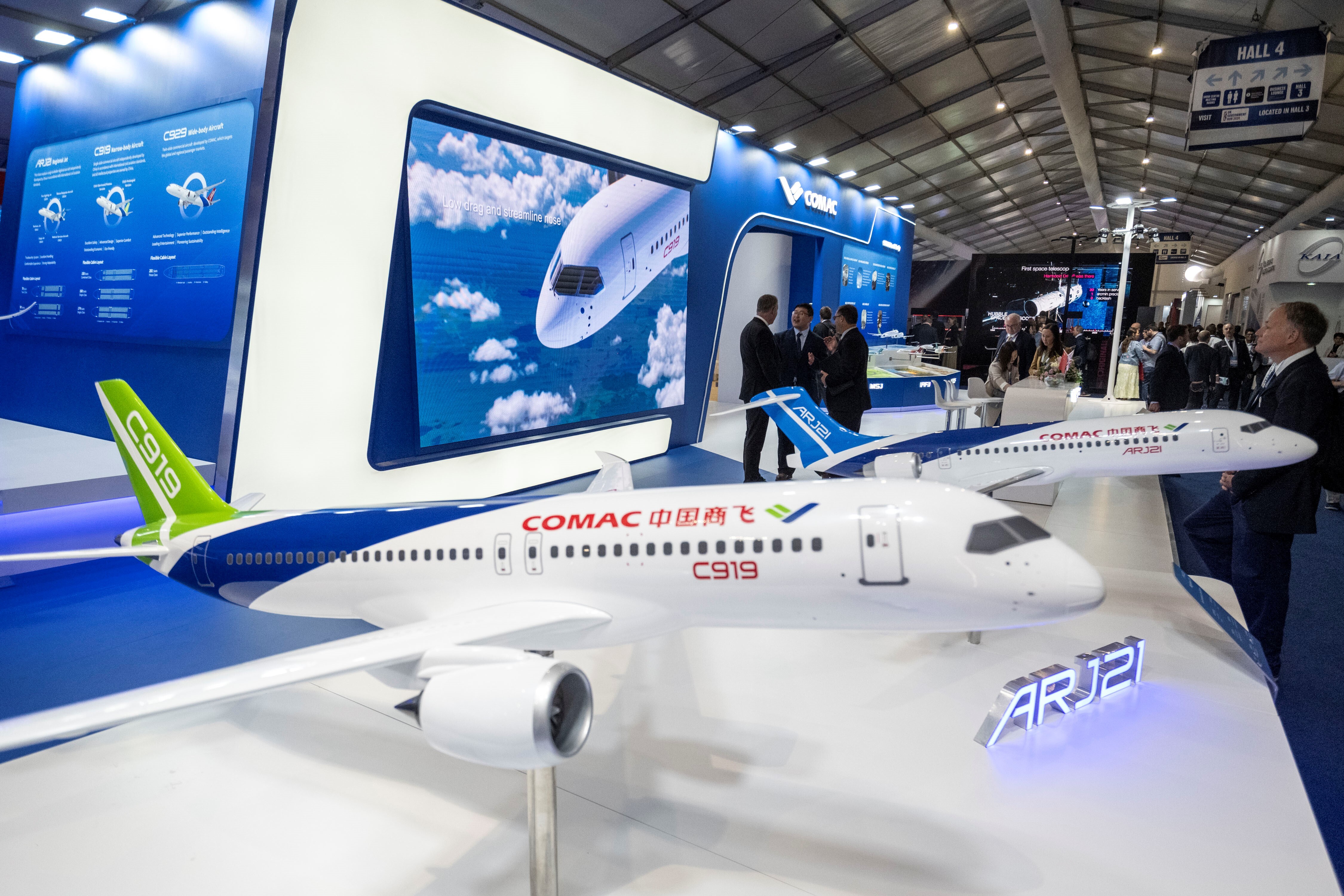 Models of the C919 and ARJ21 aircrafts are on display at the booth of aircraft developer Commercial Aircraft Corporation of China, Ltd. COMAC during the Farnborough International Airshow in Farnborough, Britain, July 22, 2024. The 2024 Farnborough International Airshow closed on July 26. (Photo by Stephen Chung/Xinhua via Getty Images)